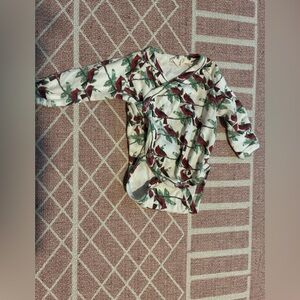 Kate Quinn Cardinal Onesie